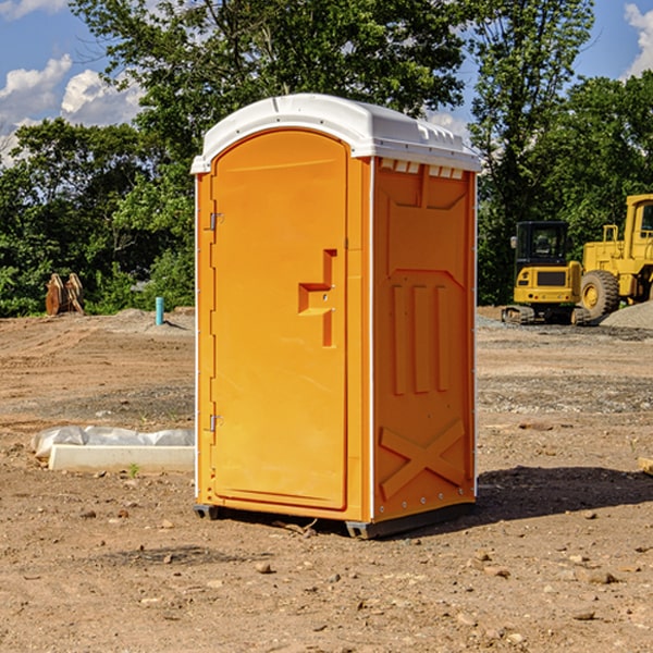 how often are the portable restrooms cleaned and serviced during a rental period in Athens